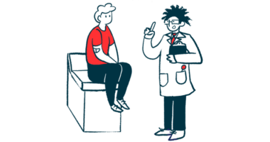 A doctor consults with a patient who's sitting on an examining table.