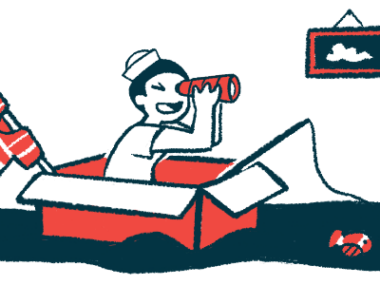 A child pretends to be a sailor, sitting in a box on a blanket.