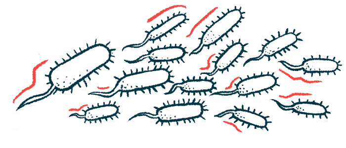 An illustration shows multiple microscopic bacteria.