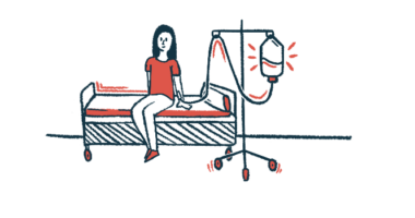 A woman hooked up to an IV sits on an exam table.