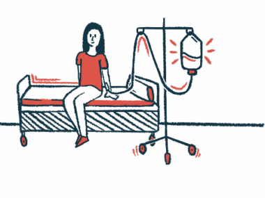 A woman hooked up to an IV sits on an exam table.