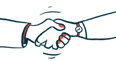 Two hands, one with red fingernails, are seen shaking in agreement.